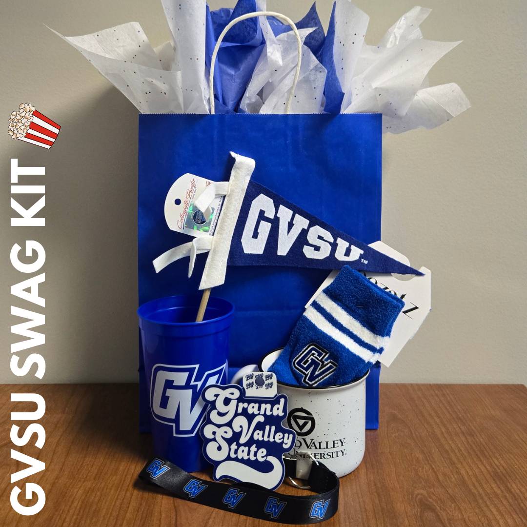 GVSU mini flag, GV plastic cup, GVSU mug, GV lanyard, Grand Valley State sticker, and GV socks